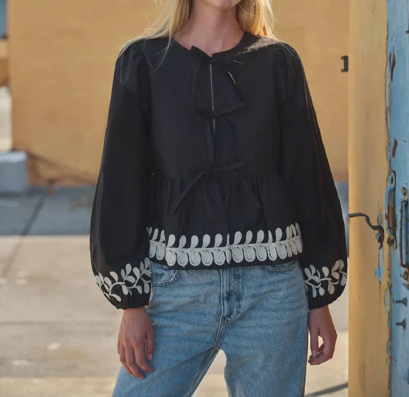 Timeless Elegance Redefined Embroidered Peplum Blouse In Black